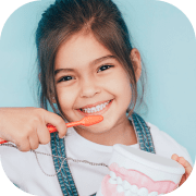 Une fille avec une brosse à dents